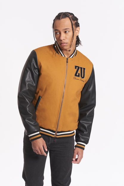 Varsity jacket in two materials with zip and patch